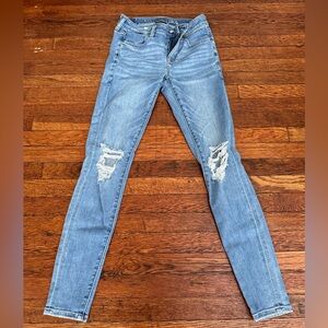 American Eagle skinny jeans with holes in the knees (stretchy)